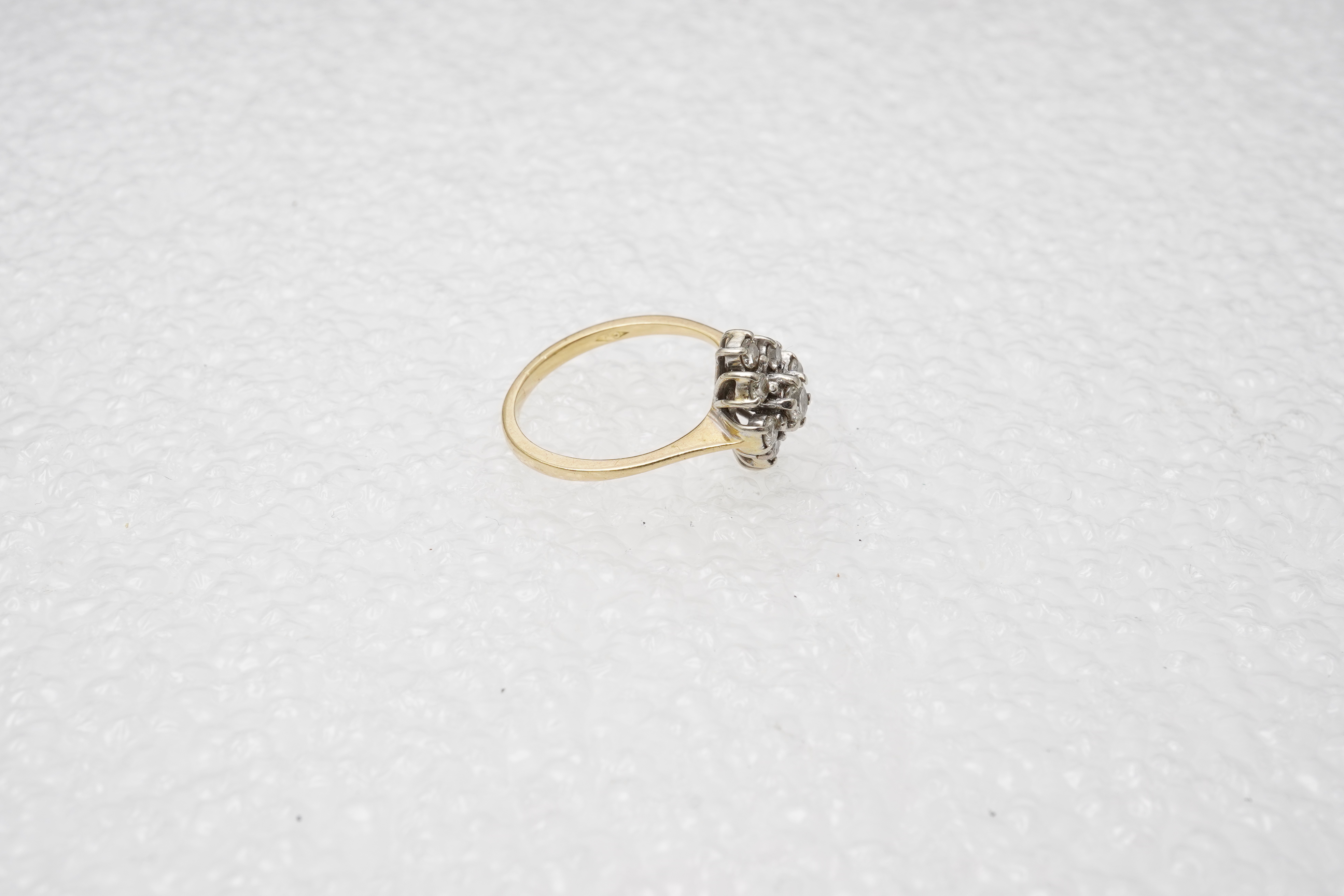 A diamond cluster ring